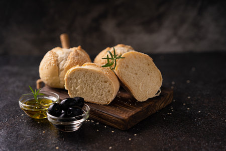 Fresh baked sourdough sesambrÃ¶tchen bread buns with sesame seeds. Artisan bakeryの写真素材