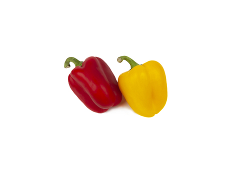yellow and red sweet pepper, on a white background, side viewの写真素材