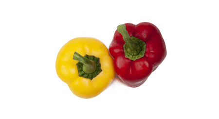 yellow and red sweet pepper on a white background, top viewの写真素材