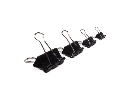 Black Paper clip isolated on white background.の写真素材