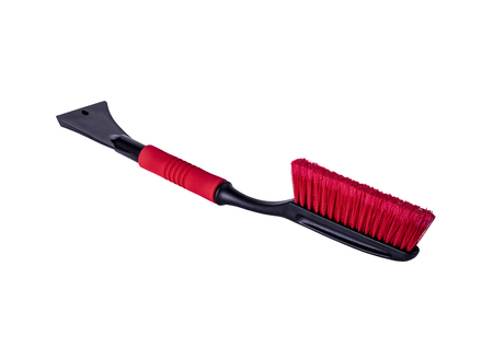 Car accessories for winter - plastic ice scrapers, red telescopic snow brushes with long handle on white backgroundの写真素材
