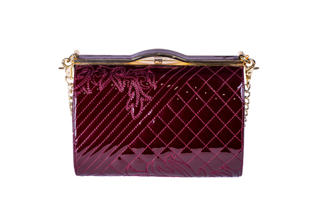 women bag made of patent leather, color brown, on a white backgroundの写真素材