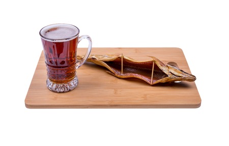 beer and fish on the boardの写真素材