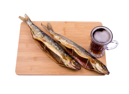 beer and fish on the boardの写真素材
