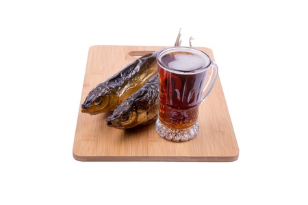 beer and fish on the boardの写真素材