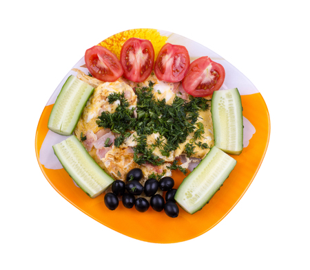 omelet with bacon, tomatoes, cucumbers, olives and dill on a white backgroundの写真素材