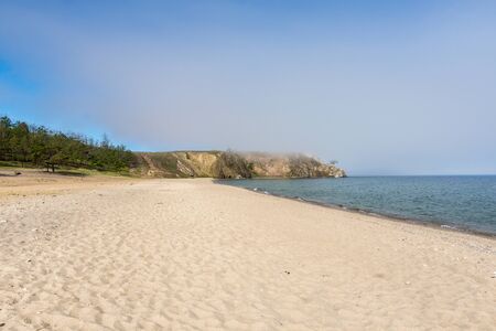 Beautiful view of Lake Baikal on a clear summer day from the shore of Olkhon Islandの写真素材