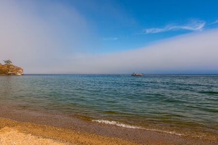 Beautiful view of Lake Baikal on a clear summer day from the shore of Olkhon Islandの写真素材