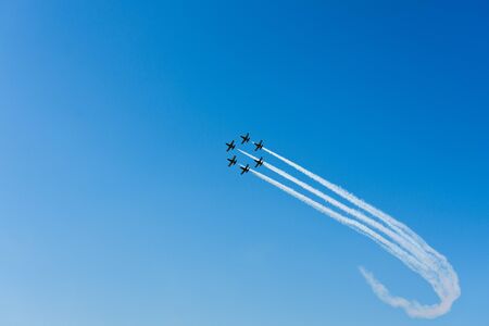 Russia, Zhukovsky airfield August 30, 2019 six sports planes of the aerobatic team of the Baltic bees show aerobatics at the mask air show 2019 in Zhukovsky, photo taken in the summer on a sunny dayのeditorial素材