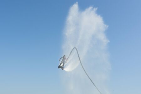 Russia Zhukovsky August 30, 2019 flyboarders show at the air show max 2019 photo taken in the summer...
