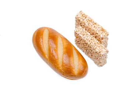 loaf of white bread and two Korean barley cookies on a white backgroundの写真素材