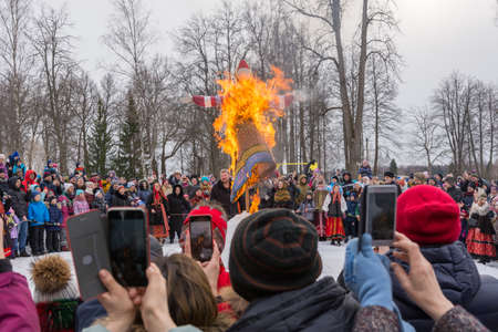 Russia, Abramtsevo estate March 1, 2020, Russian holiday Maslenitsa, photograph taken on a cloudy winter dayのeditorial素材