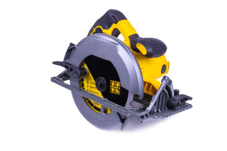 yellow circular saw on white background, object isolated, background white, side view
