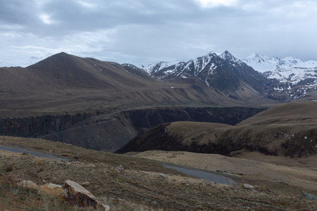 picturesque view of the mountains of the North Caucasus, photo taken on a cloudy spring day