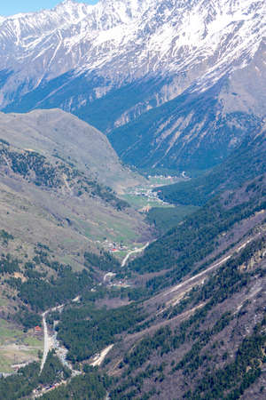a beautiful view of the mountains and the Baksan Gorge in the northern Caucasus in Russia, the photo...