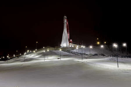 Russia January 04, 2022 Kaluga, view of the Vostok space rocket with illumination at the start, photo taken at nightのeditorial素材
