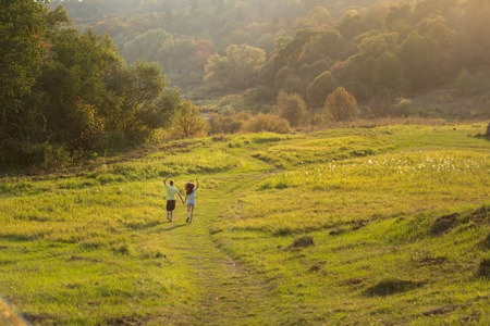 Happy couple at sunset, nice backgrond