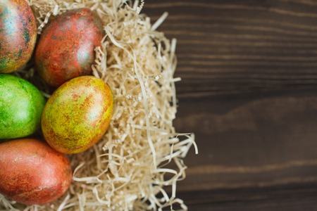 Easter eggs on wooden backgroundの写真素材