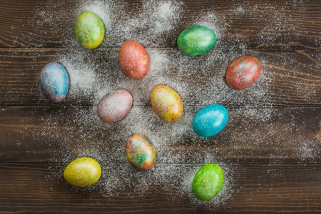 Easter eggs on wooden backgroundの写真素材