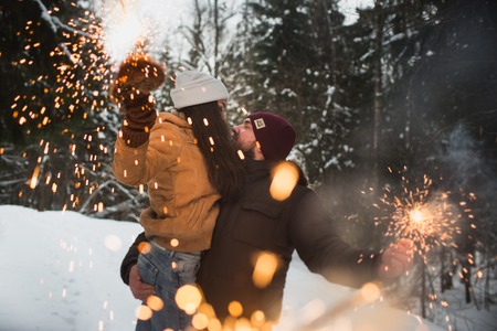 Romantic young couple is kissing. First kiss of young love.