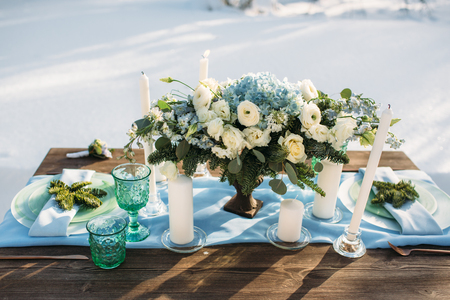 Beautiful flowers and decoration on table in wedding day, winterの写真素材