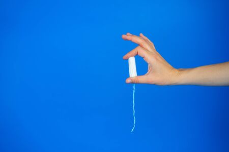 womens health and medicine - tampons in handの写真素材