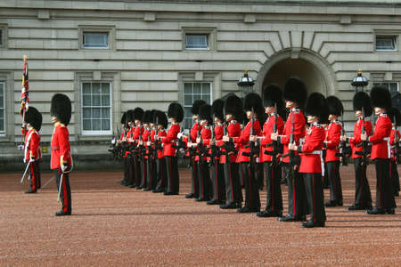 The changing of the guard at Buckingham Palace.