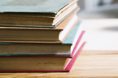 Closed books on the deskの写真素材