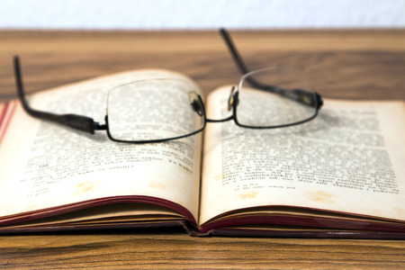 Old book and glassesの写真素材