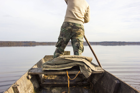 Men in boat on the river, rowing, adventure, realの写真素材