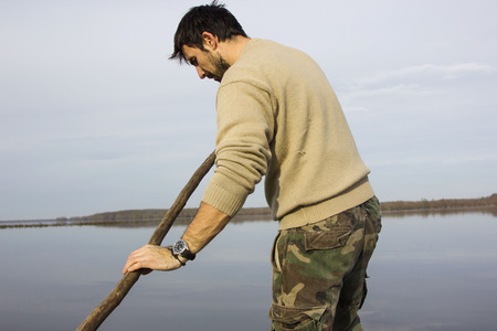 Man in boat on the river, rowing, adventure, realの写真素材