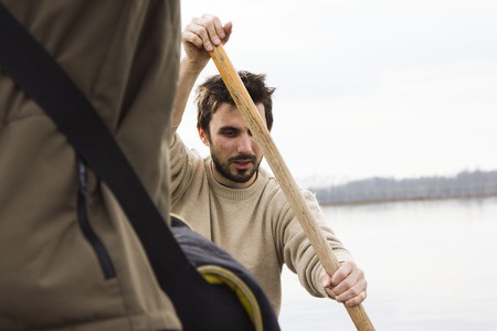 Men in boat on the river, rowing, adventure, realの写真素材