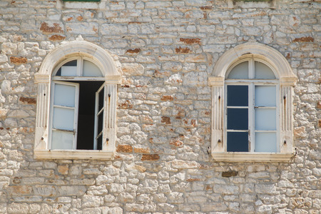 Windows on old traditional house in Sibenik, Croatia, facade detailsの写真素材