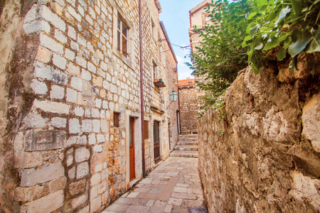 Narrow street and houses walls in the Old Town in Dubrovnik, Croatiaの写真素材