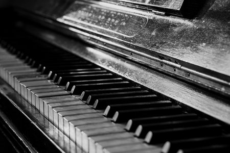 Old rusty piano keyboard, selective focus, black and whiteの写真素材