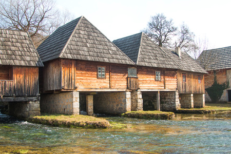 Old wooden water mills in on Majerovo vrilo, source of Gacka river, Lika, Croatiaの写真素材