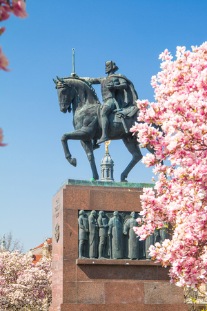 Spring in Zagreb, Croatia, tree blossom and king Tomislav statue in parkの写真素材