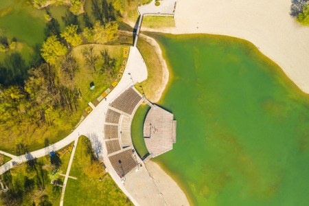 Croatia, Zagreb city, Bundek lake from drone, overhead view, green recreaction park