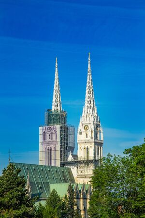 Zagreb, capital of Croatia, catholic cathedral hidden among treesの写真素材
