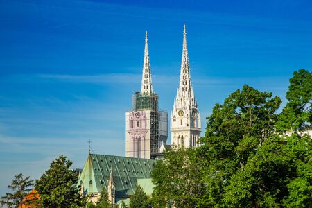 Zagreb, capital of Croatia, catholic cathedral hidden among treesの写真素材