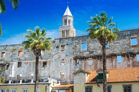 Split, Croatia, walls of palace of Roman emperor Diocletian from 3rd century,  tower of cathedral in backgroundの写真素材