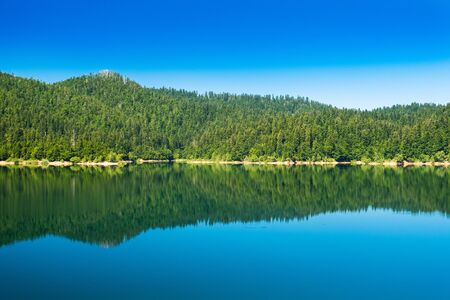 Lake in Gorski kotar, Lokve, Croatia, forest reflection in watterの写真素材