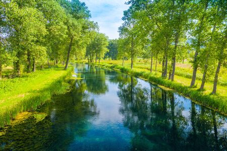 Beautiful river Gacka, drone aerial over the river surface between the trees, Lika region of Croatiaの写真素材