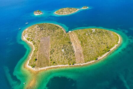 Beautiful heart shaped island of Galesnjak near Zadar in Dalmatia, Croatia, aerial view from droneの写真素材