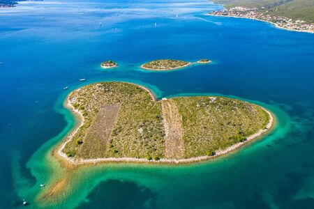 Beautiful heart shaped island of Galesnjak near Zadar in Dalmatia, Croatia, aerial view from droneの写真素材
