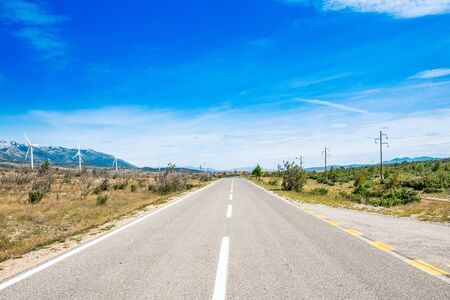 Scenic road and wind farms in Croatia in Zadar backgroundの写真素材