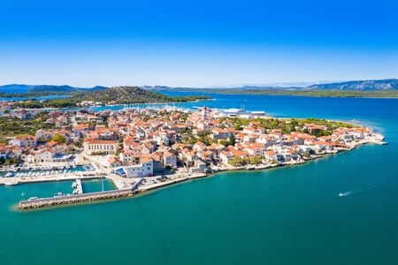 Croatia, Adriatic coast, panoramic view of the small town of Betina from air on Murter islandの写真素材
