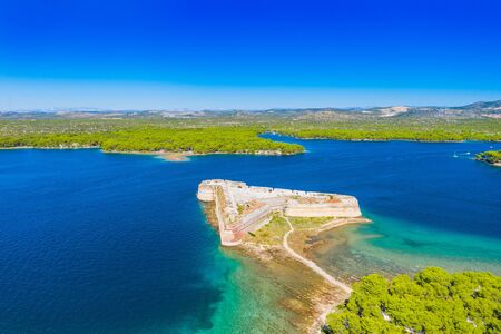 Saint Nicholas fortress at Sibenik bay entrance, Dalmatia, Croatia, drone aerial shot of beautiful blue coastline seascapeの写真素材