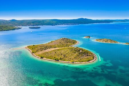 Heart shaped island of Galesnjak near Zadar in Dalmatia on Croatian Adriatic sea, aerial view from droneの写真素材