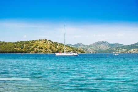 Croatia, Adriatic coast, beautiful seascape on Dugi Otok island, yachts anchored in blue bays in Telascica national parkの写真素材